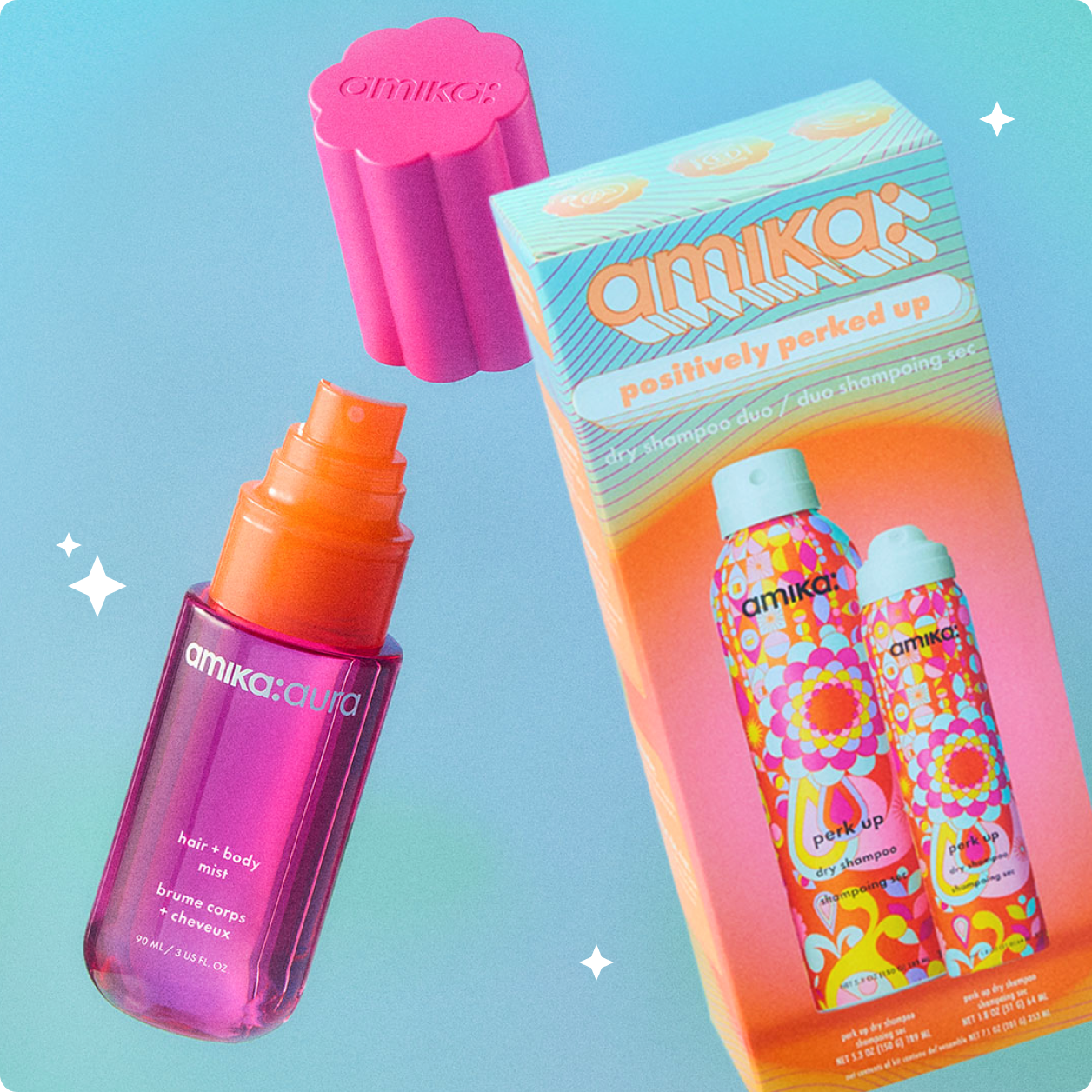 amika:aura hair + body mist bottle and the positively perked up gift set against a light blue background