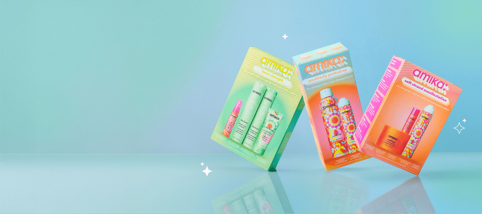 amika gift sets soft strand manifestation, positively perk up, and inner strength are set against a light blue backround