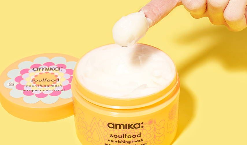 finger scooping soulfood nourshing mask out of jar