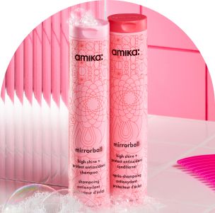 Image of mirrorball high shine + protectant antioxidant shampoo and conditioner against a pink tiled background.