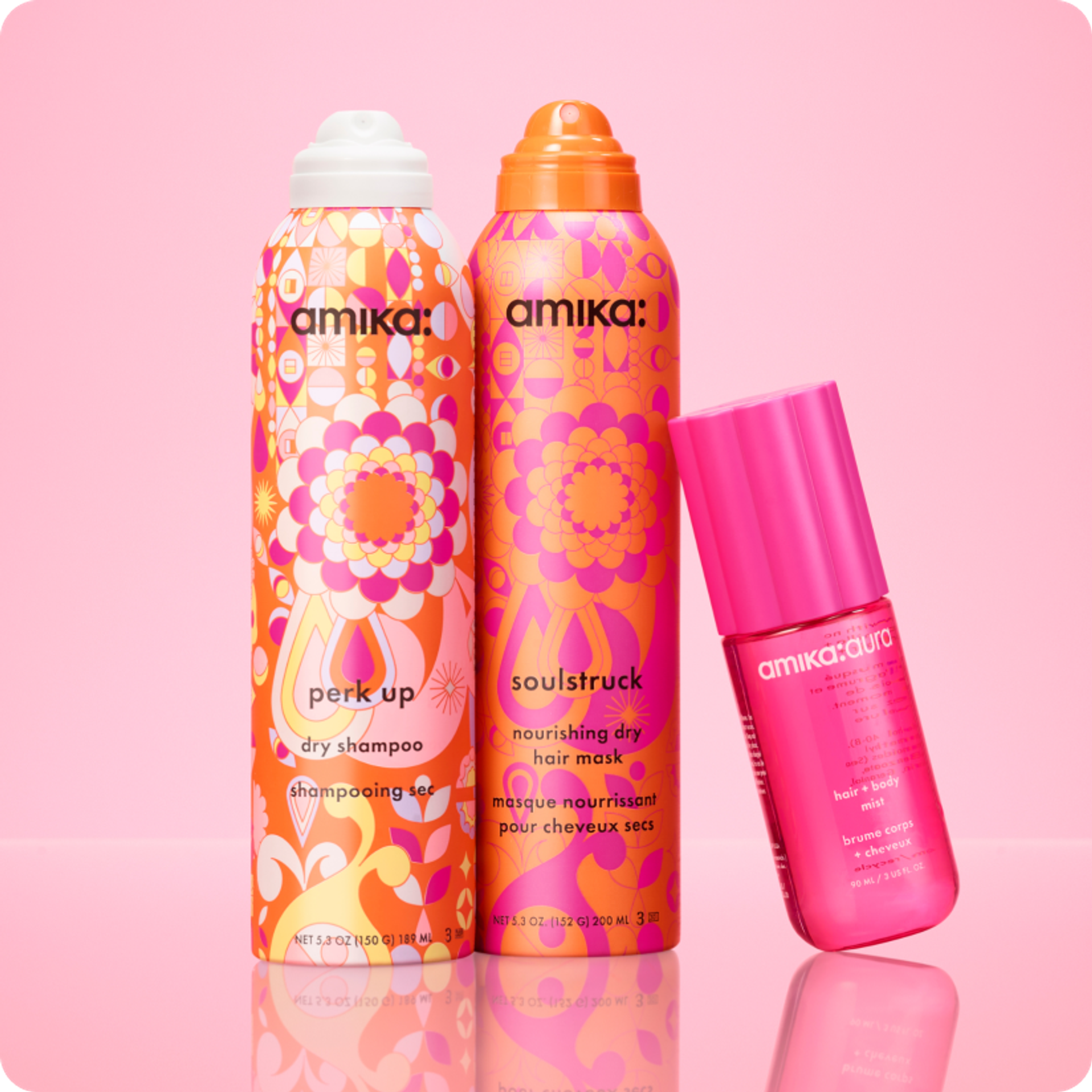 amika products on a pink shelf with pink background