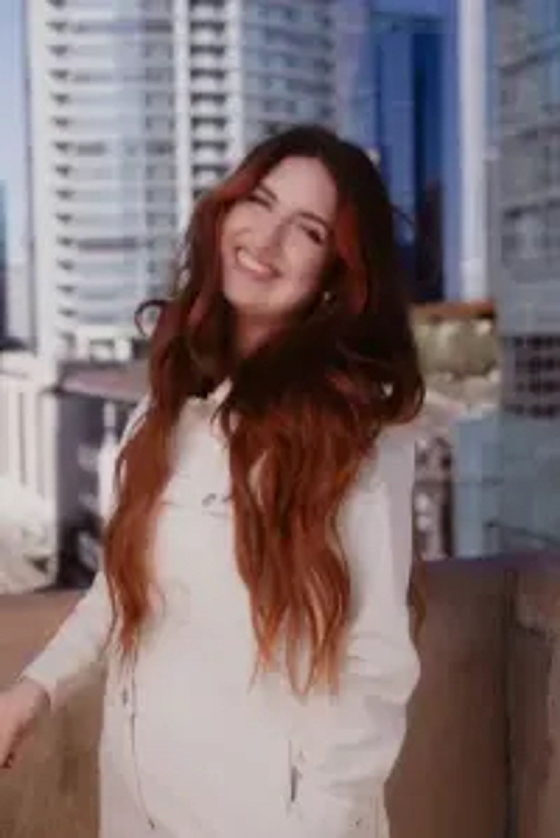 person with curled hair