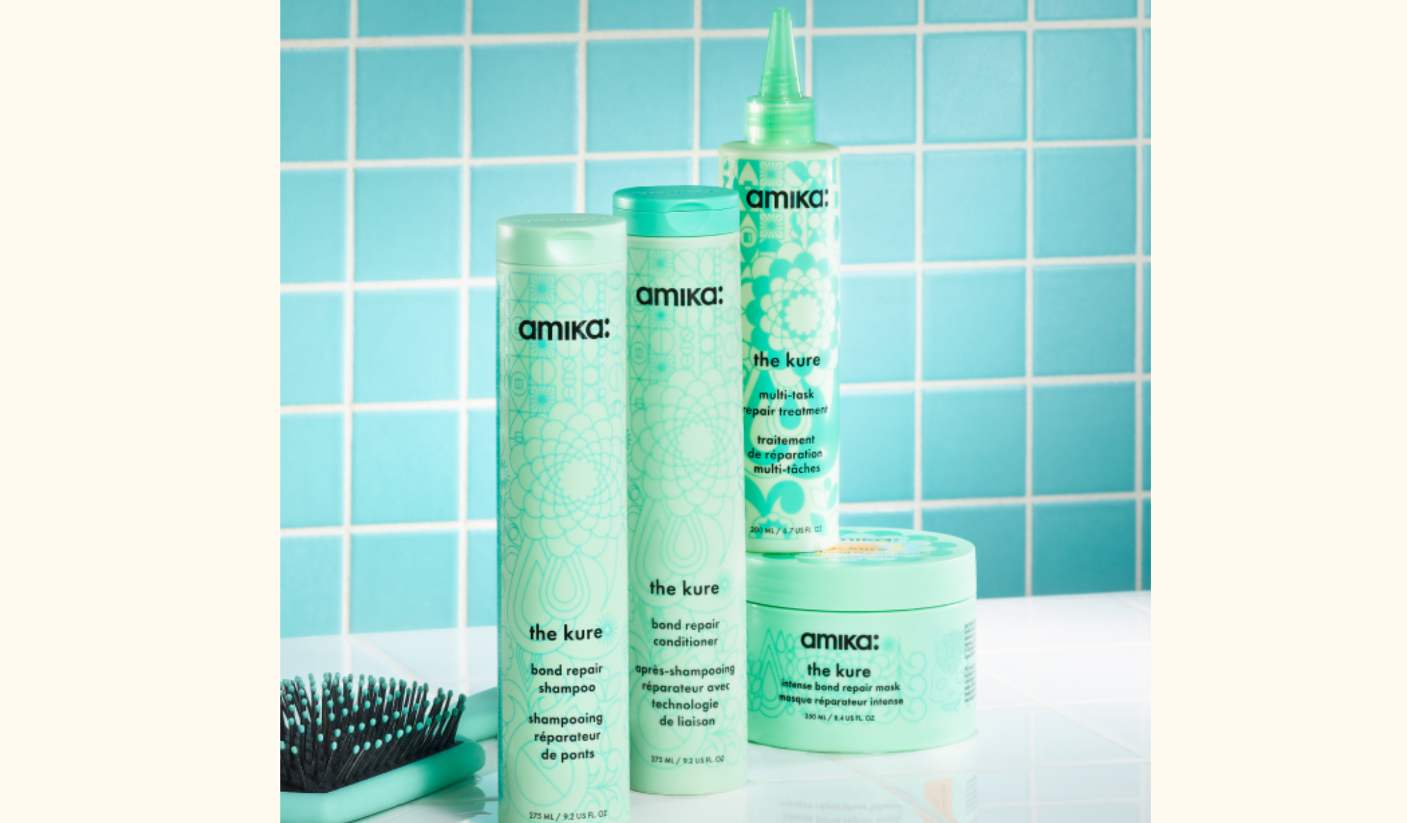 the kure collection on a counter top with a blue-green tile background