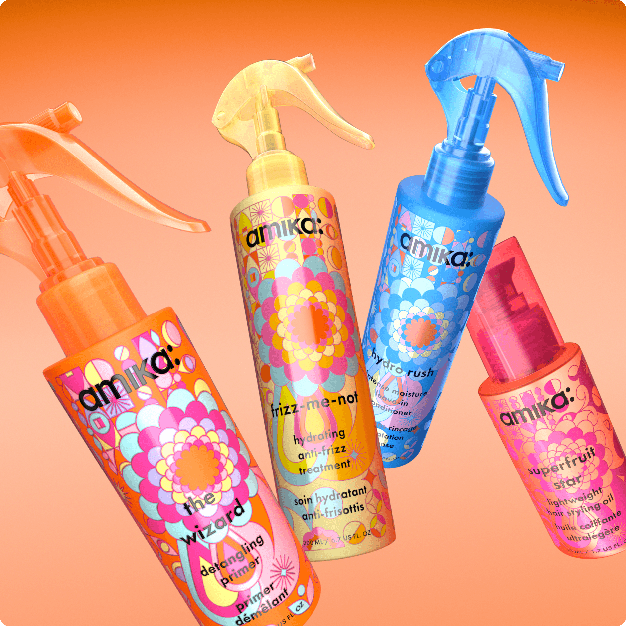 amika treatments: hydro rush leave in conditioner, superfruit star oil, the wizard detangling primer and frizz-me-not anti-frizz treatment against an orange backdrop