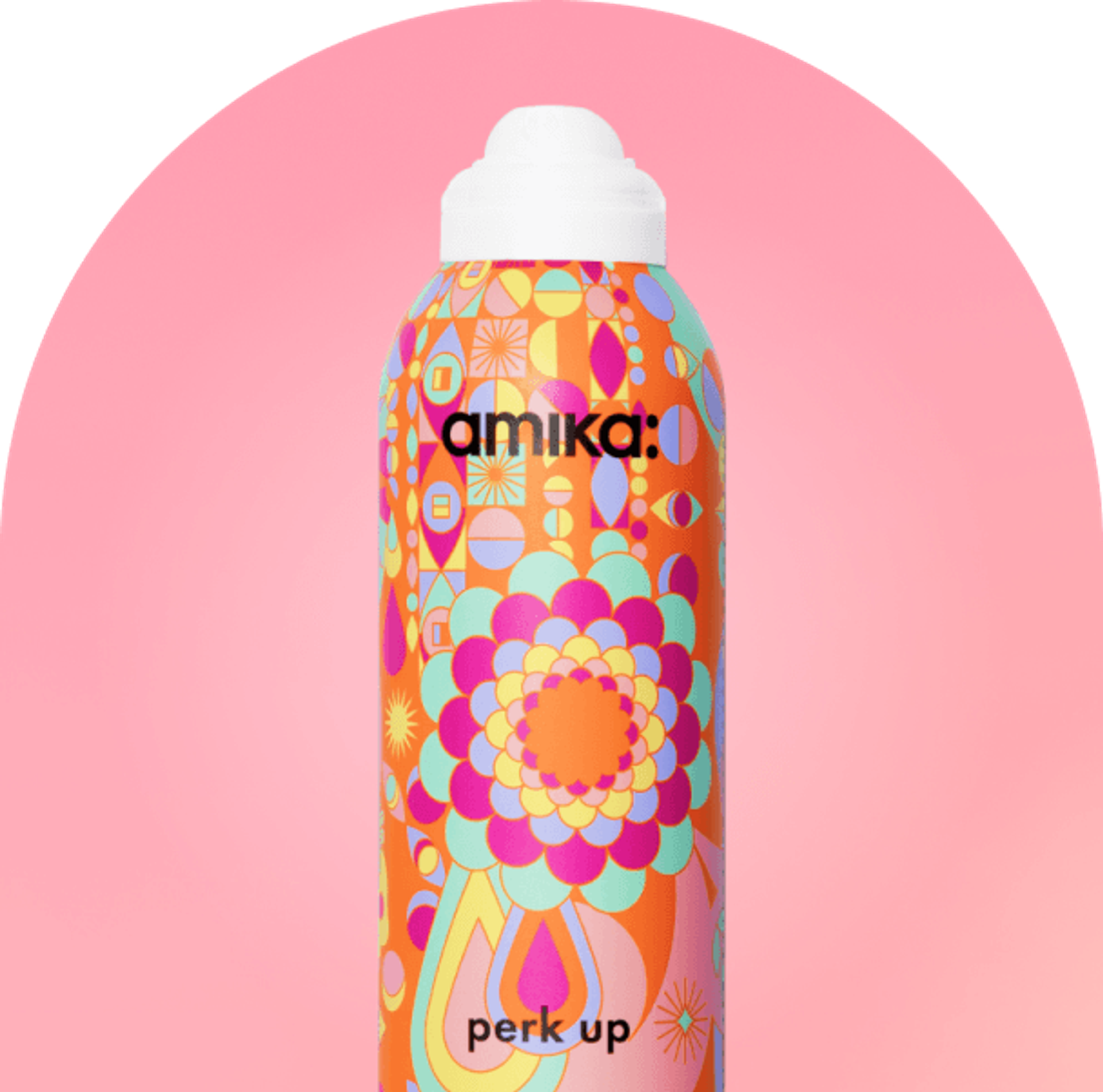 amika perk up bottle against a pink background