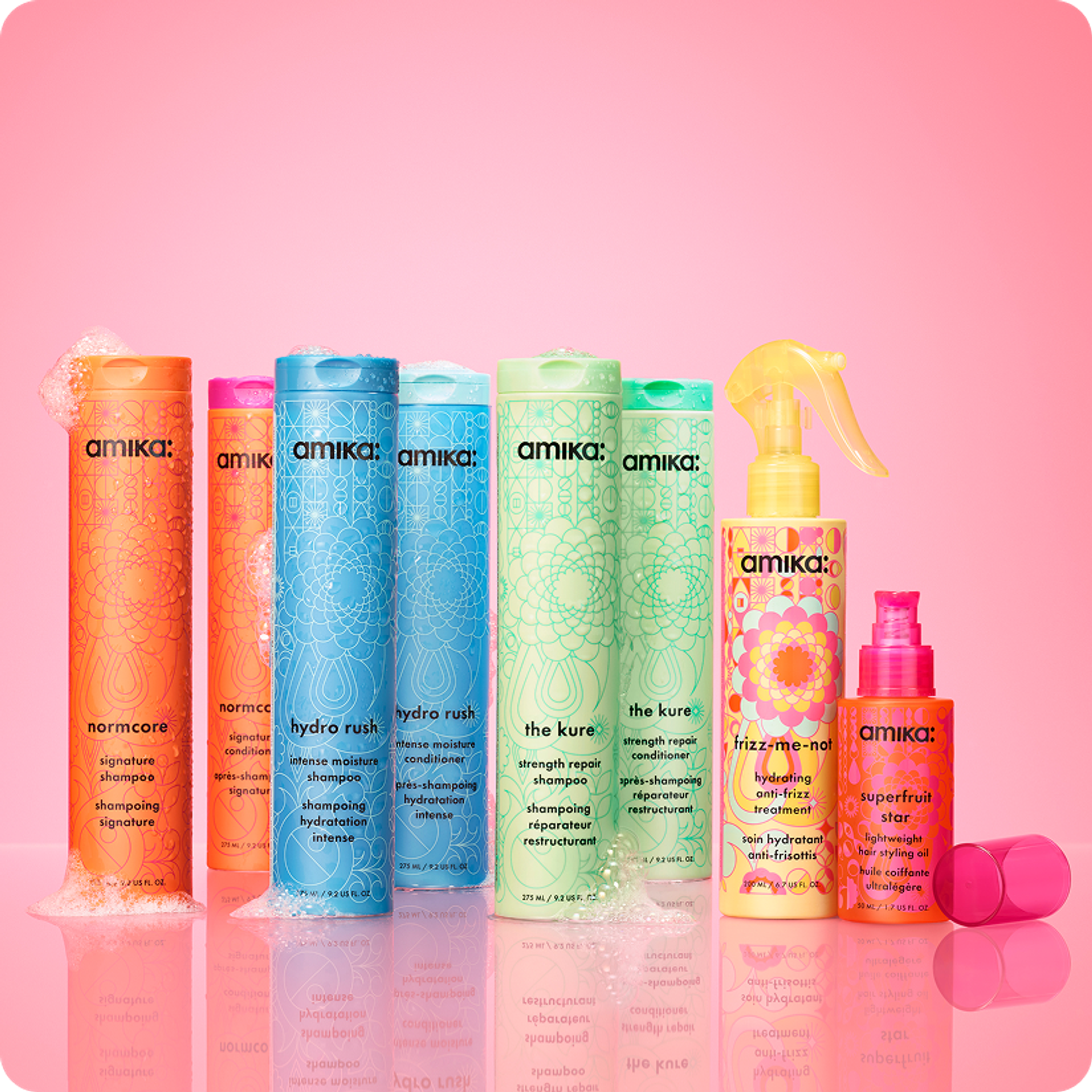 amika products on a pink shelf with pink background