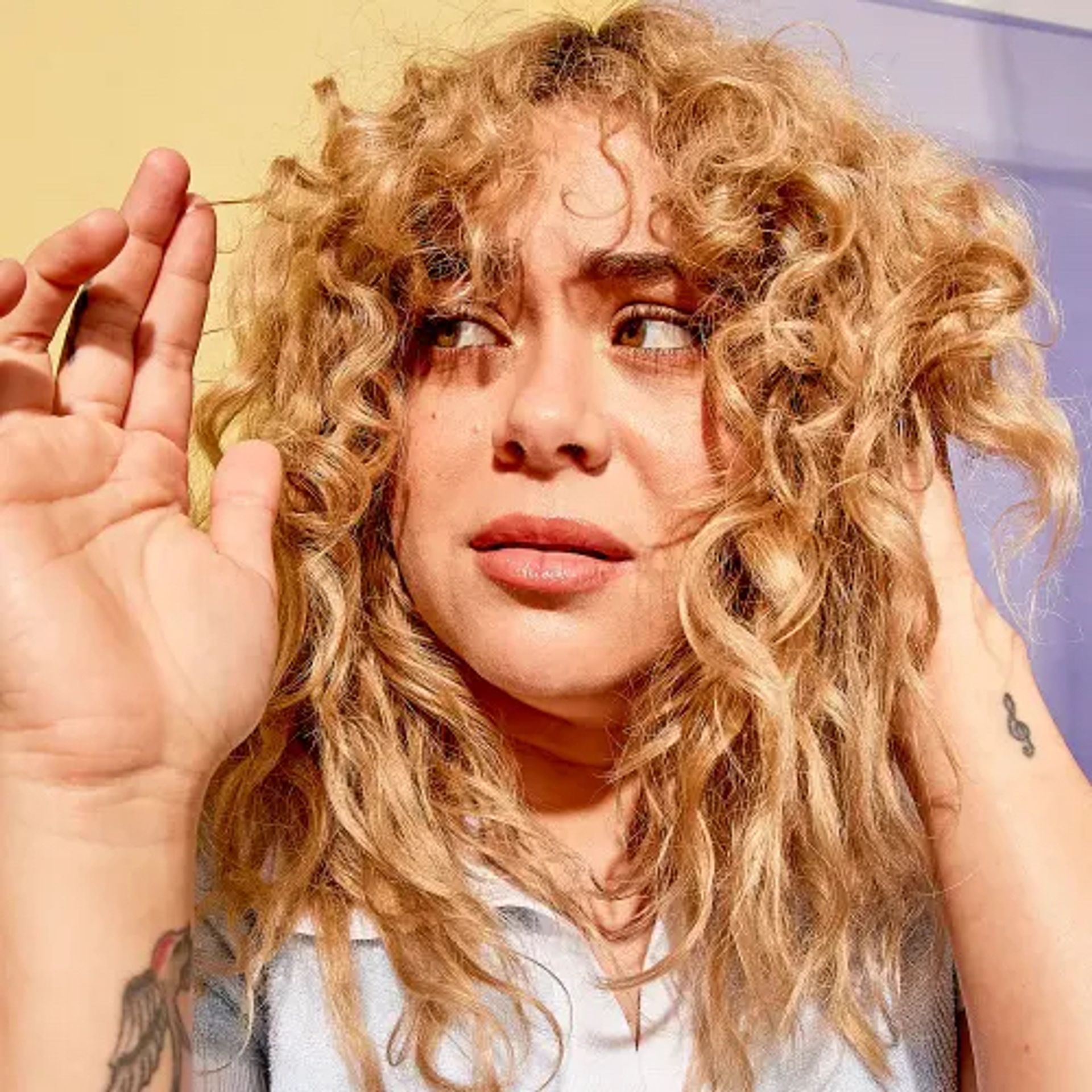 model looking concerned about hair