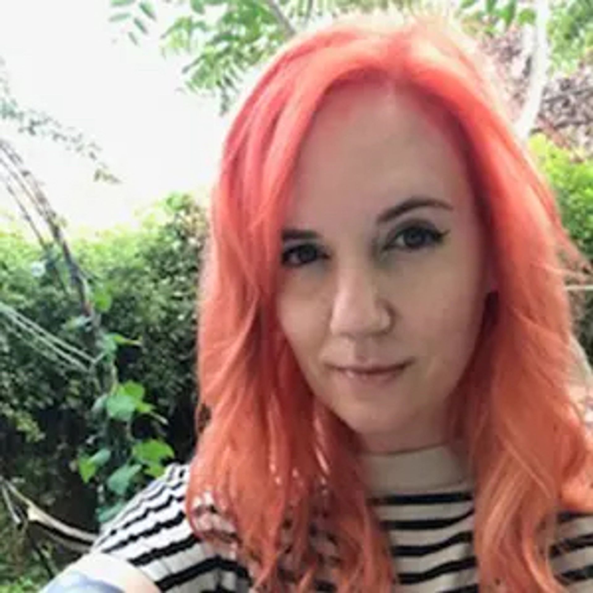person posing with styled hair