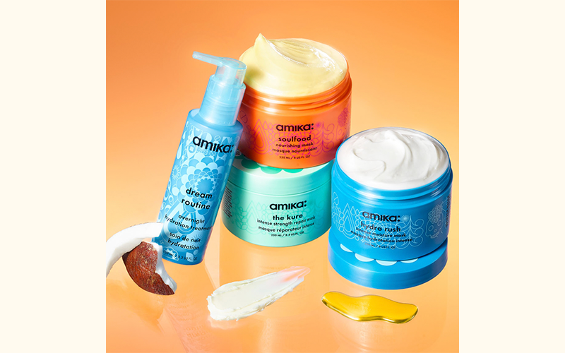 amika masks: hydro rush, soulfood, dream routine, and the kure sit on an orange background