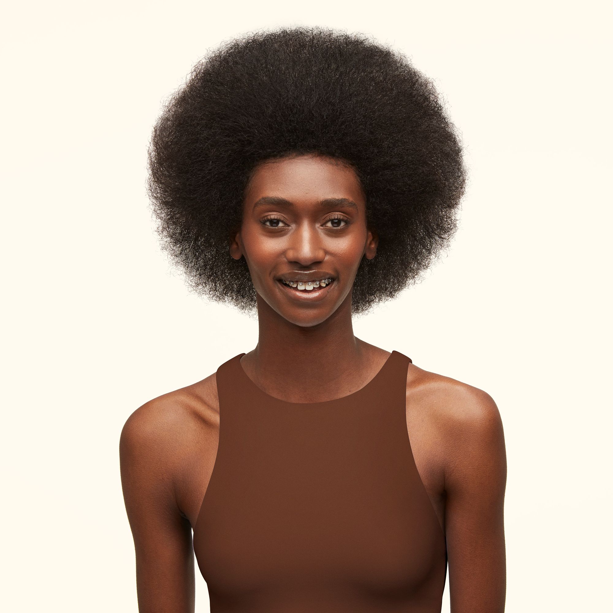 model with highly textured hair type