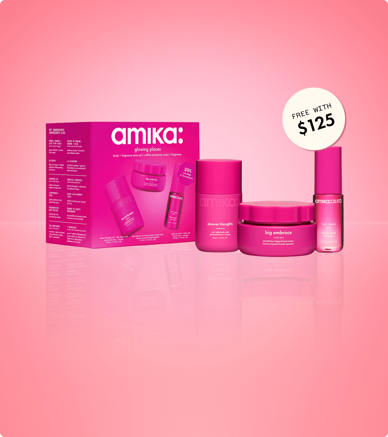 amika glowing places body + fragrance minis set stands against a pink background. a sticker reads: "free with $125" (orders)