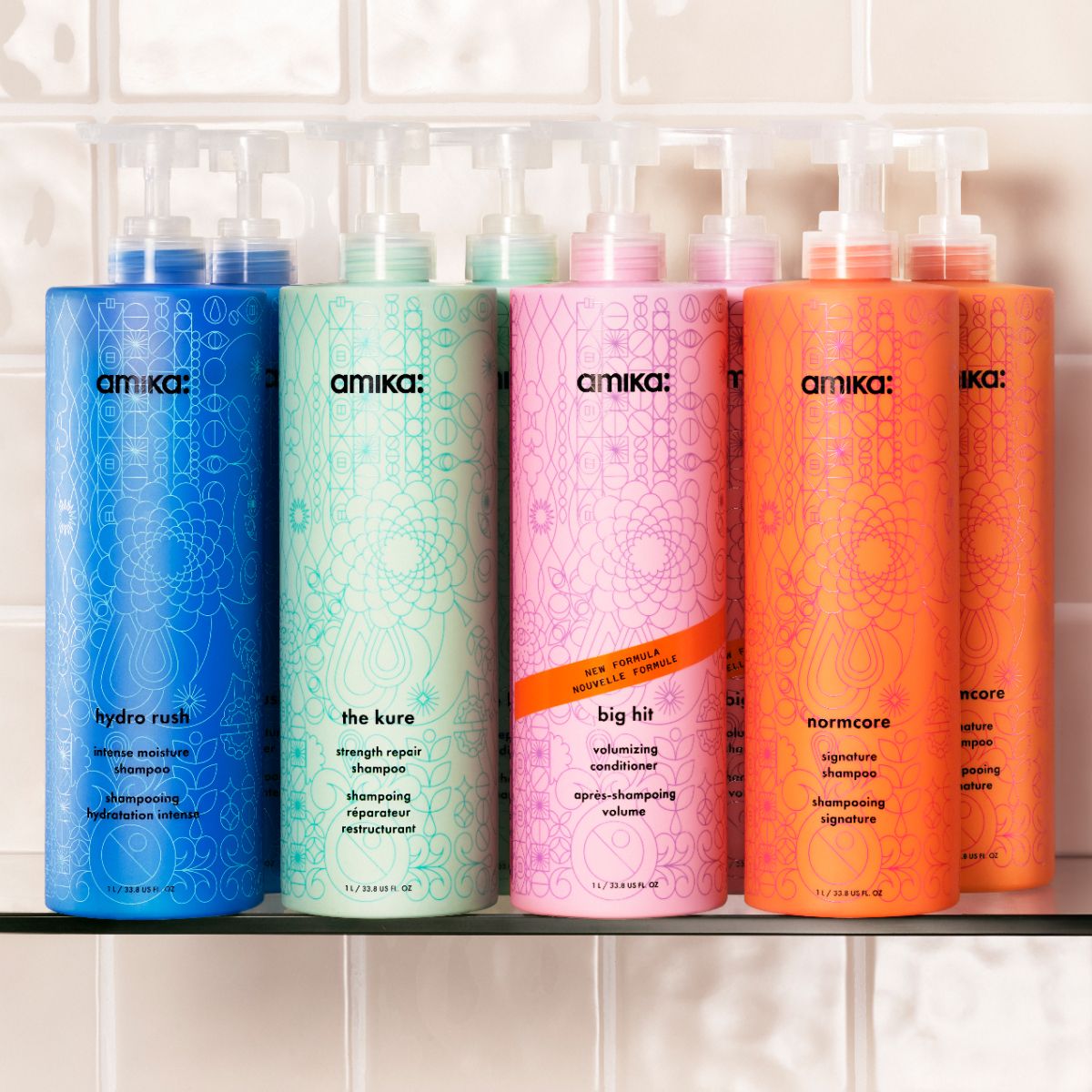 liter-sized bottles of amika shampoos + conditioners