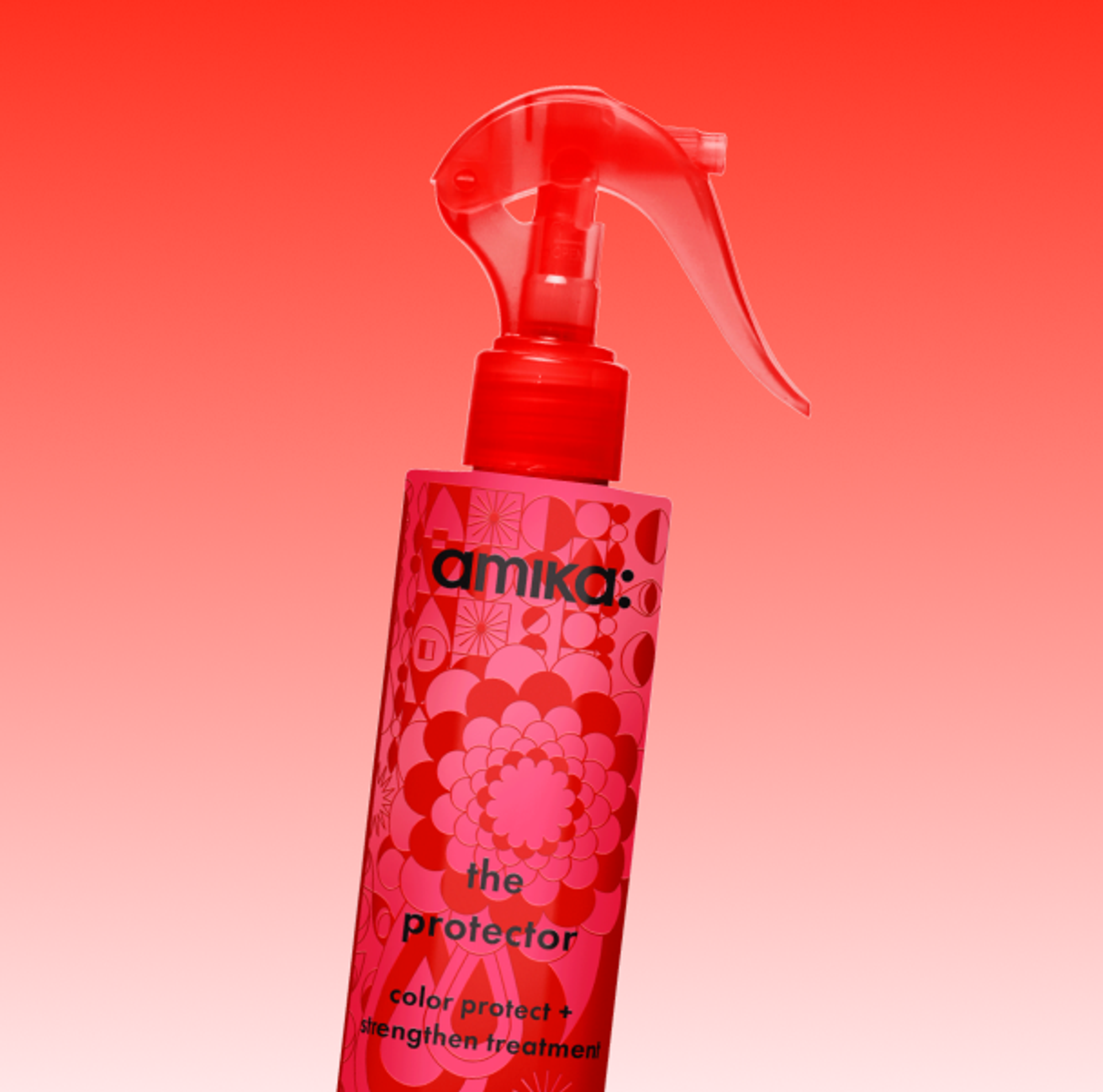 a bottle of amika's the protector treatment against a red gradient background