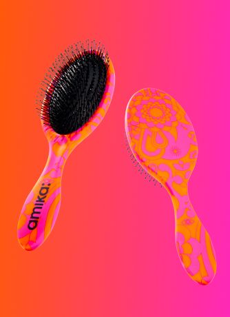 FREE - select one (1) detangling brush w/ any $125+ order