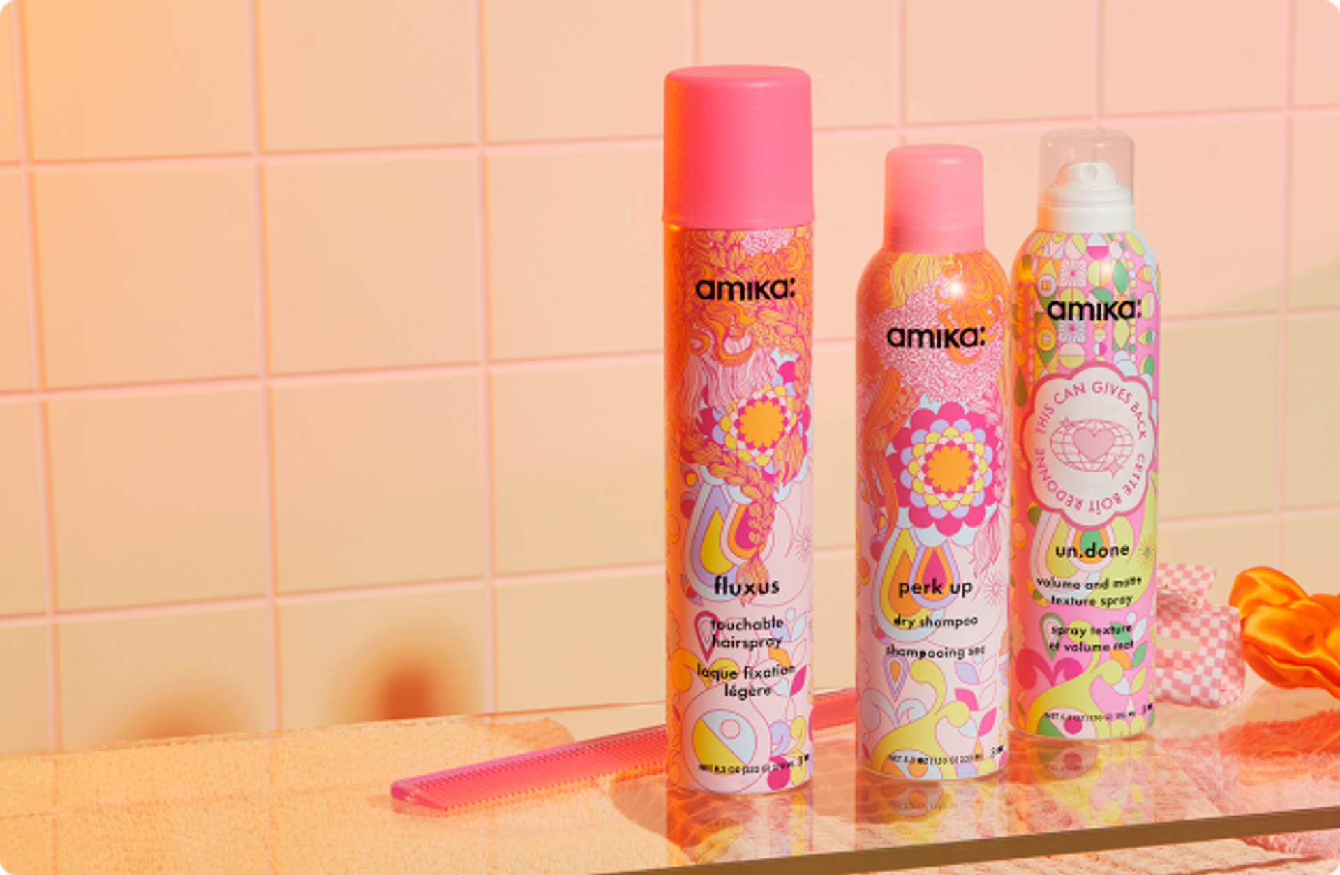 fluxus touchable hairspray, perk up dry shampoo, and un.done volume and matte texture spray