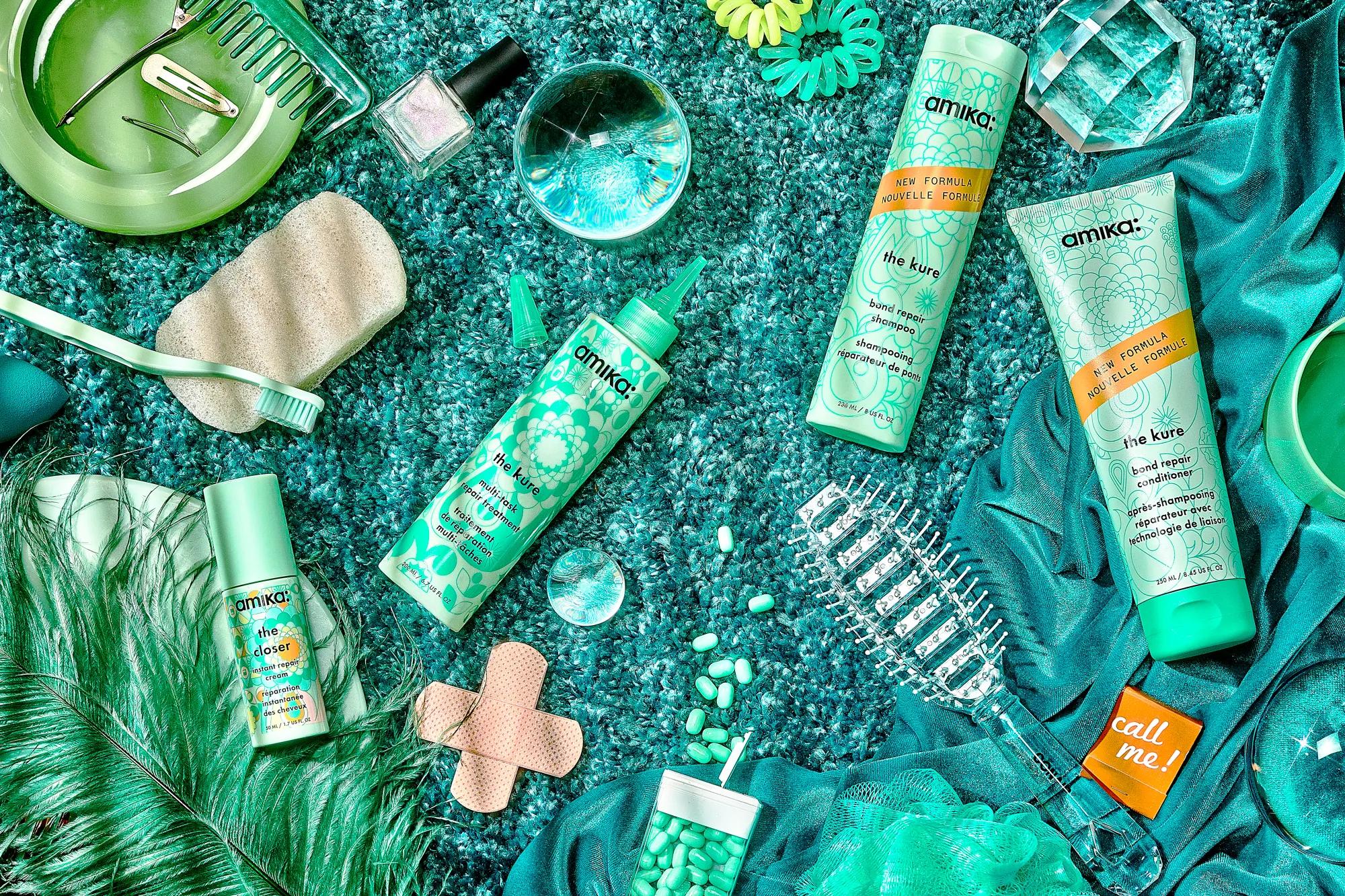 the repair collection product line on green background with props