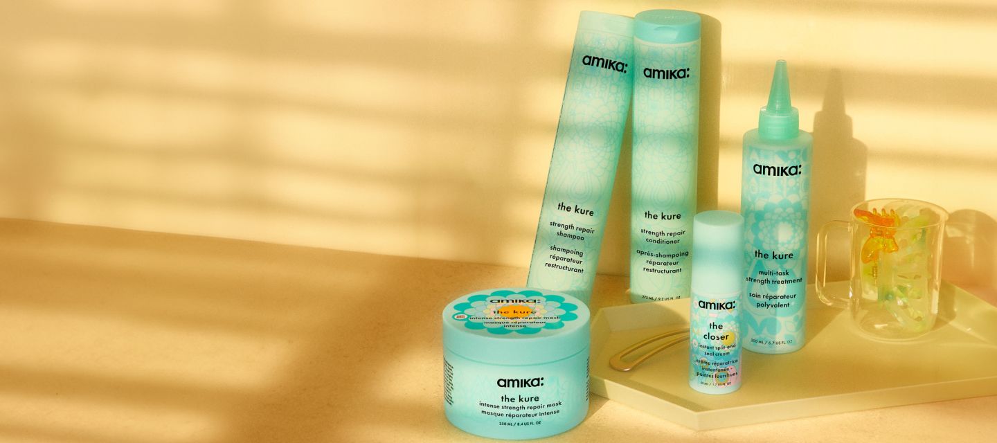 image of the kure collection. image features the kure strength repair shampoo 9.2 fl. oz, the kure strength repair conditioner 9.2 fl. oz, the kure intense strength repair mask 8 fl. oz, the kure multi-task strength treatment, and the closer instant split-end seal cream.