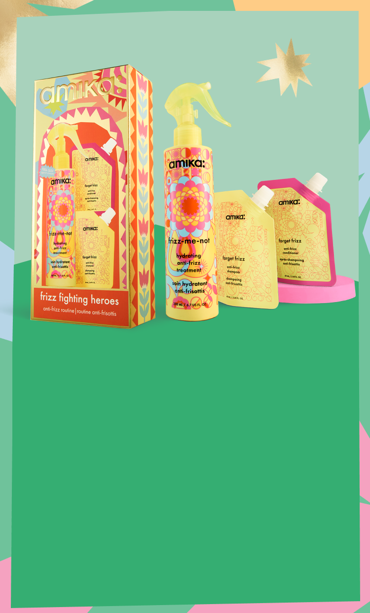 amika frizz-fighting heroes haircare gift set with a bottle of frizz-me-not treatment and small pouches of forget frizz shampoo and conditioner. they are set against a green background and a patterned pastel border