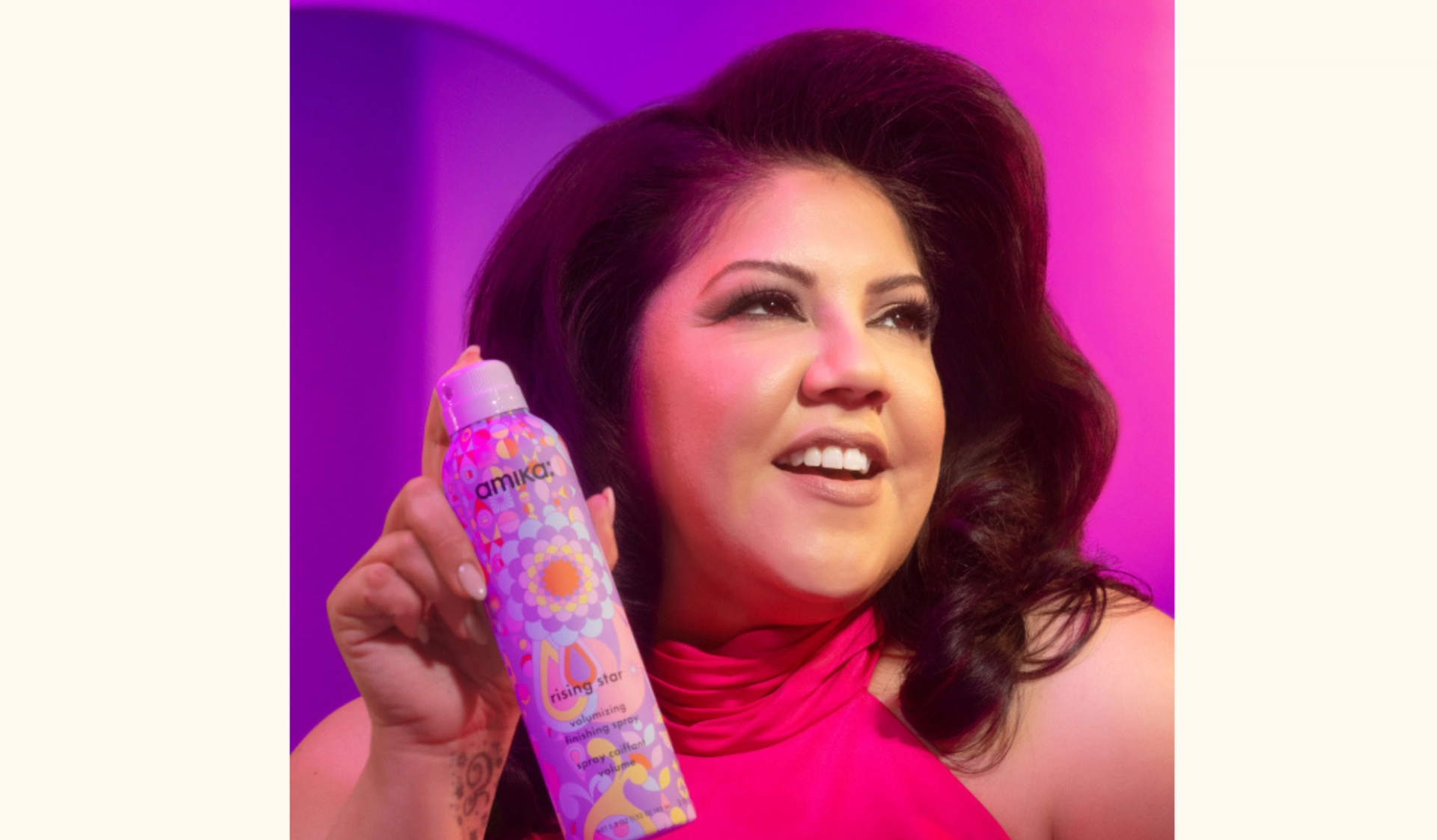 model holding rising star spray