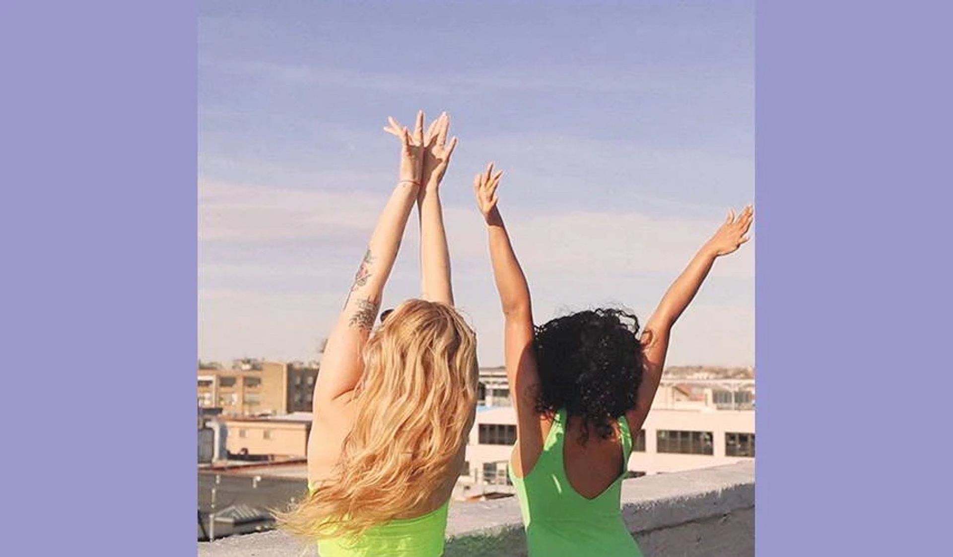 two people celebrating outside