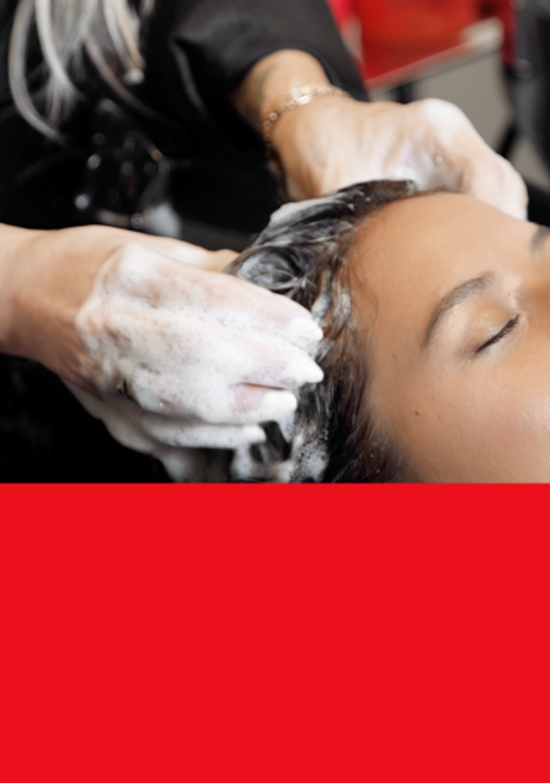 a hairstylist shampooing a client's hair