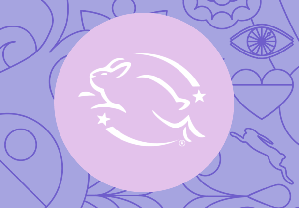 'cruelty free' leaping bunny icon image against a purple patterned background