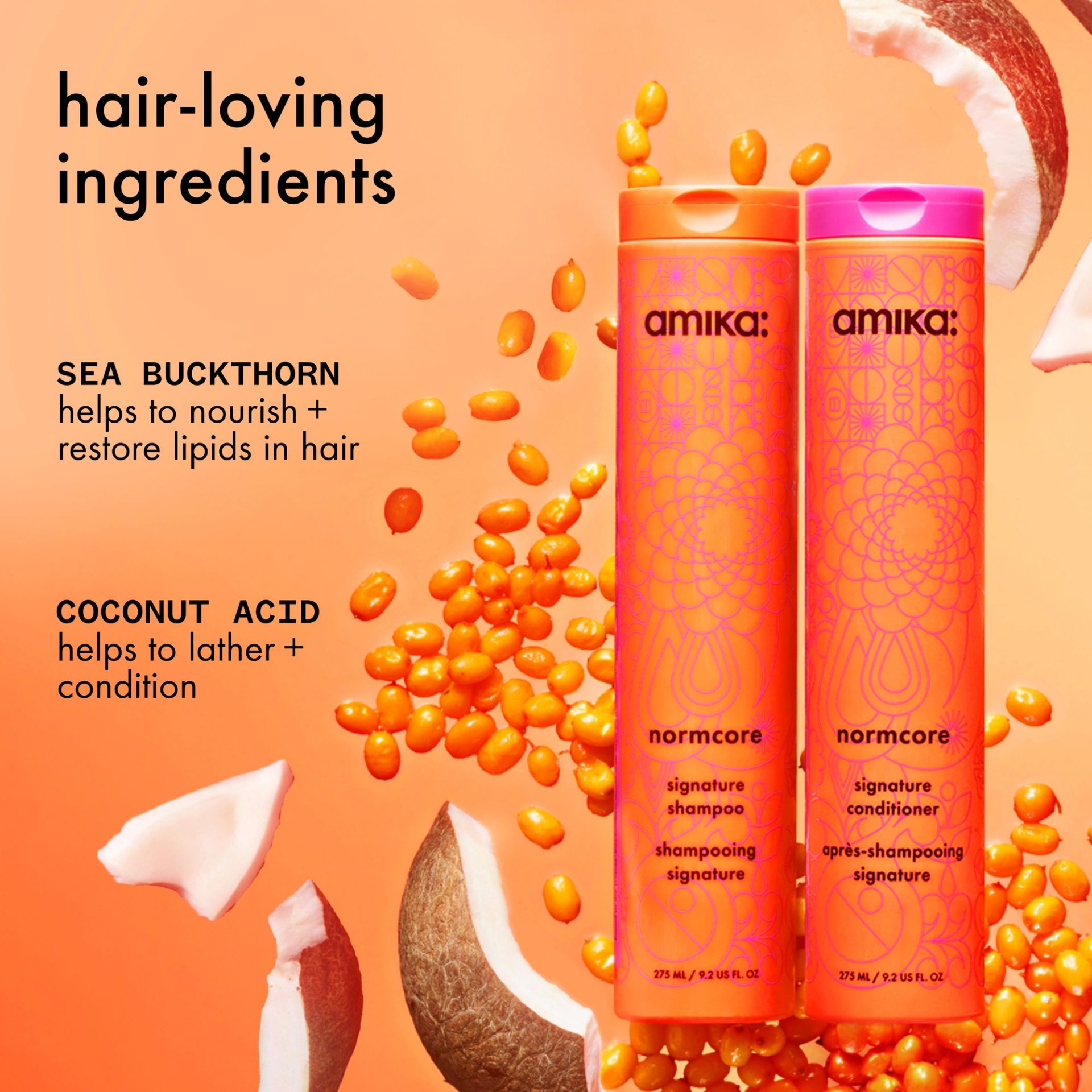 bottles of amika's normcore shampoo + conditioner with sea buckthorn berries and coconut around them against an orange background. text describes the ingredients