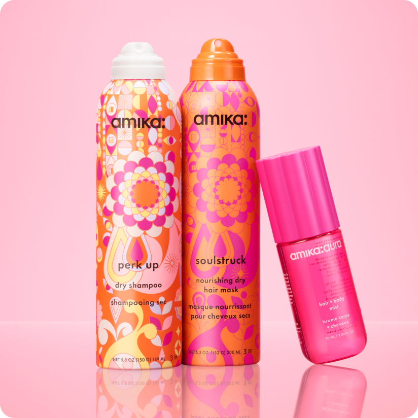 amika products on a pink shelf with pink background