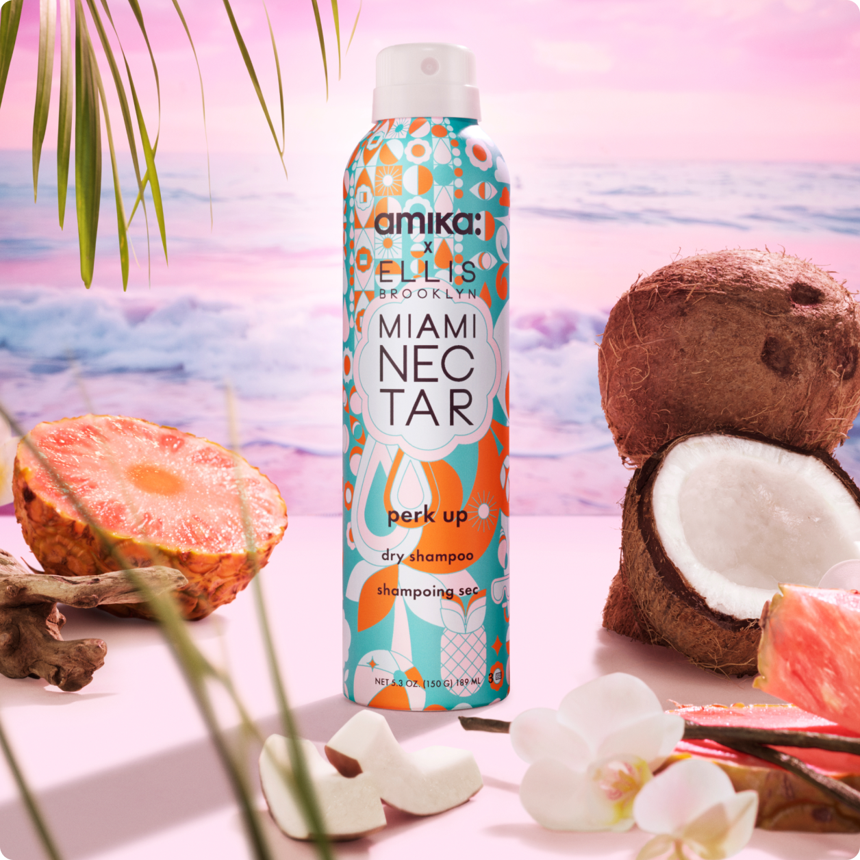 transport strands with a tropical scent. amika x Ellis Brooklyn MIAMI NECTAR perk up dry shampoo has notes of coconut water, vanilla, and pink pineapple.