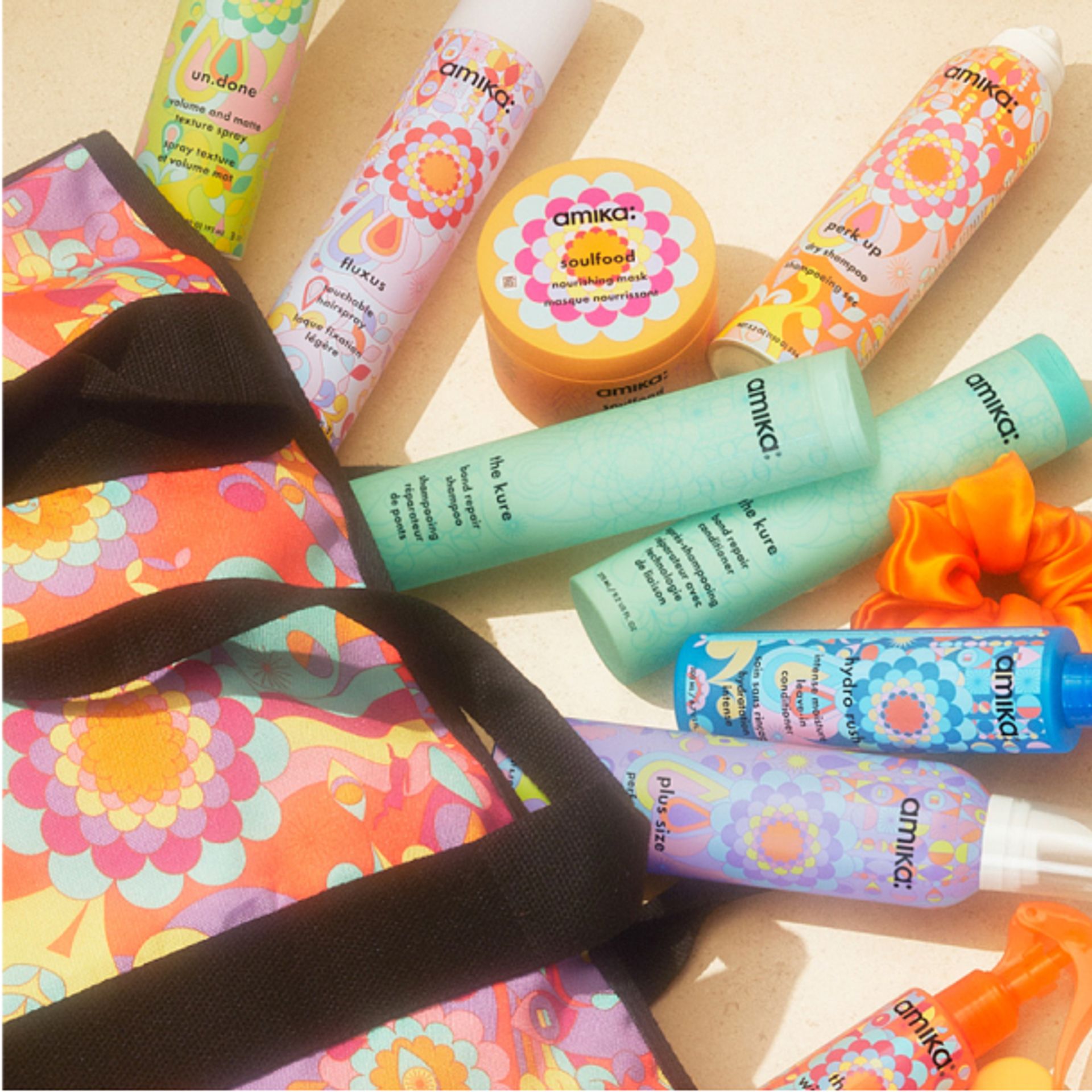 products spilling out of amika tote bag