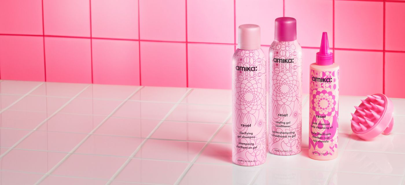 amika detox collection products: reset clarifying gel shampoo, reset cooling gel conditioner, and reset pink charcoal cleansing oil