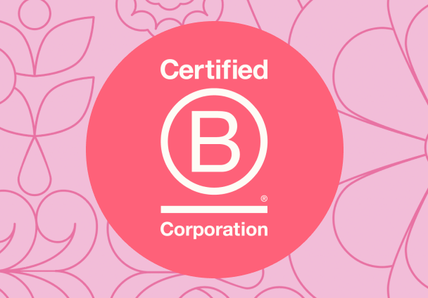 a pink icon indicating Certified B Corporation agains a pink patterned background