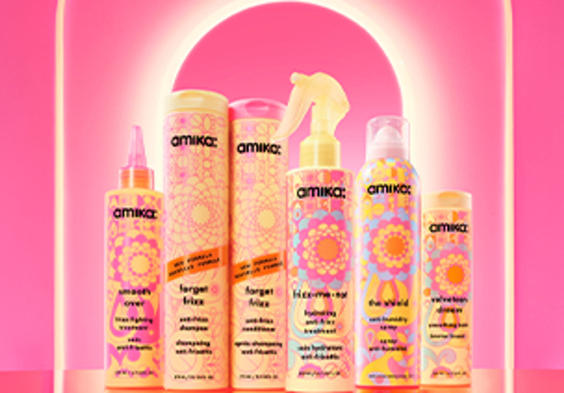 Image of the update anti-frizz collection. from left to right: smooth over frizz-fighting treatment, forget frizz anti-frizz shampoo,  forget frizz anti-frizz conditioner, frizz-me-not hydrating anti-frizz treatment, the shield anti-humidity spray, and velveteen dream smoothing balm.