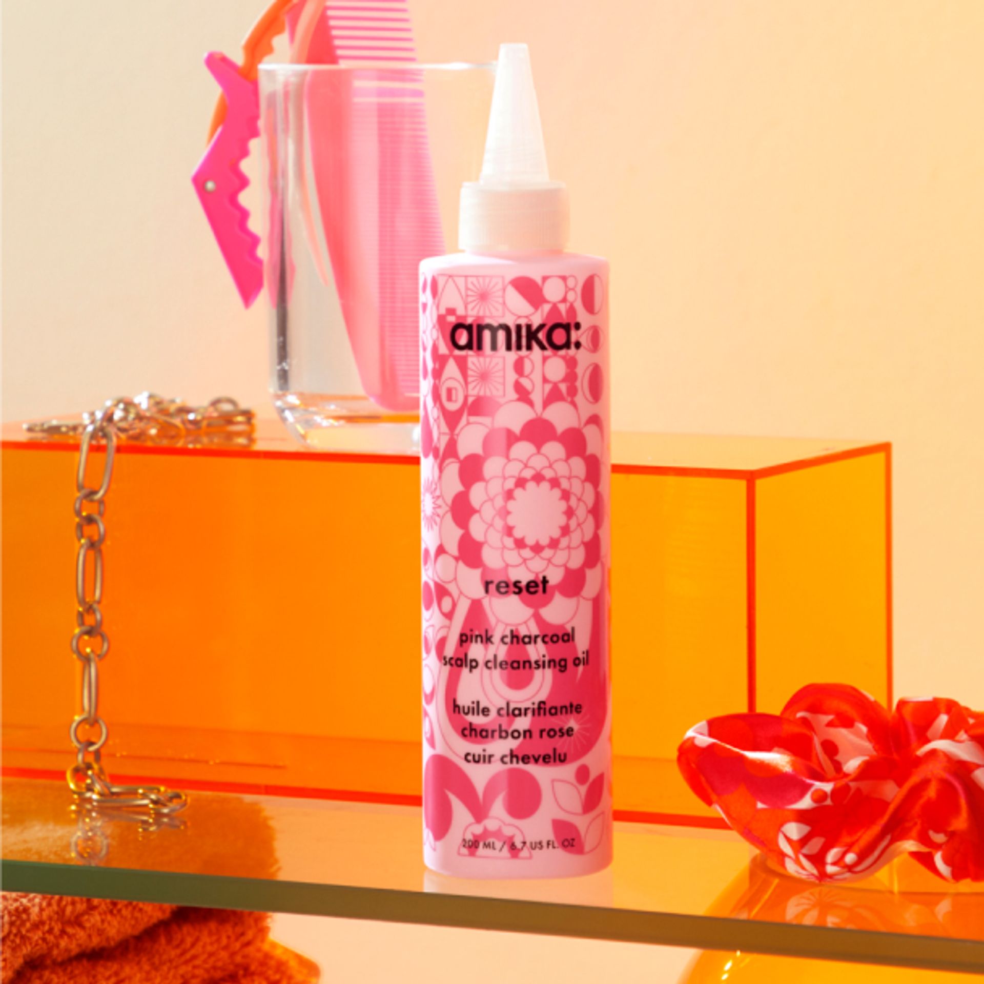 reset pink charcoal scalp cleansing oil