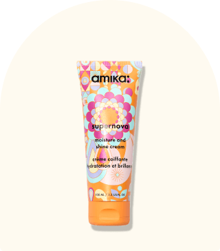 image of the supernova moisture and shine cream against a cream background.