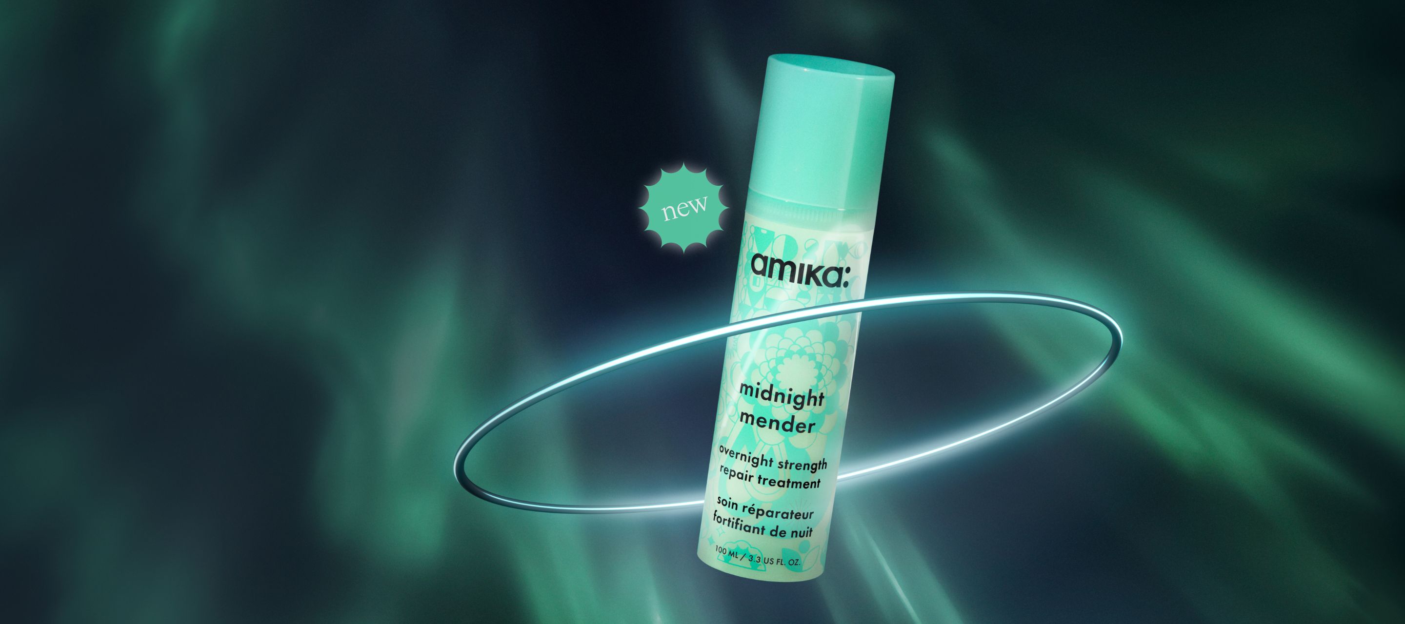 Image of midnight mender overnight strength treatment (3.3oz) against an aurora green background. The product is surrounded by a silver Saturn ring with a new icon to the left of the product.