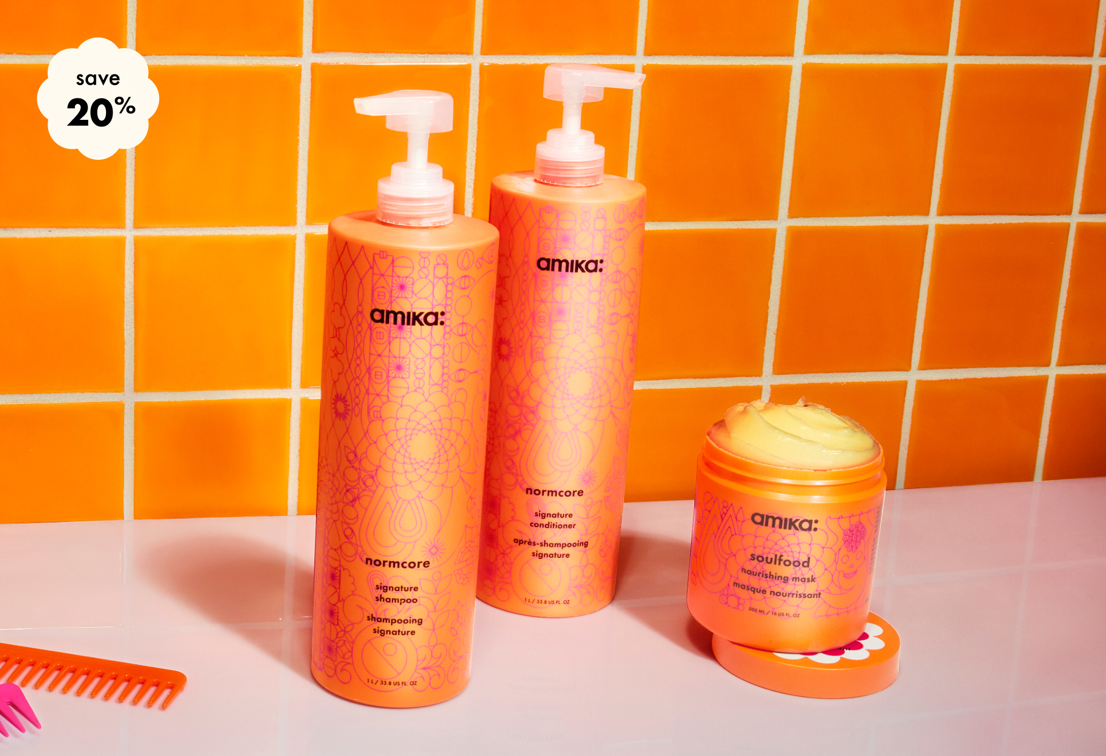 save 20% on your custom amika super-sized wash + care bundle. Bottles of shampoo, conditioner, and a jar of soulfood mask against an orange tiled background