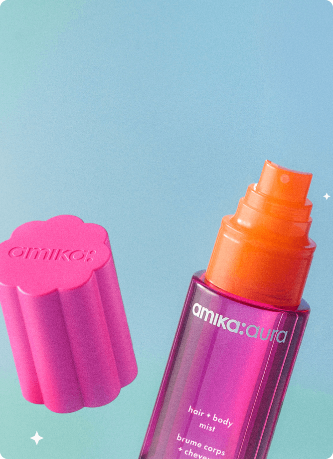 amika:aura hair + body mist appears with the lid off against a blue background