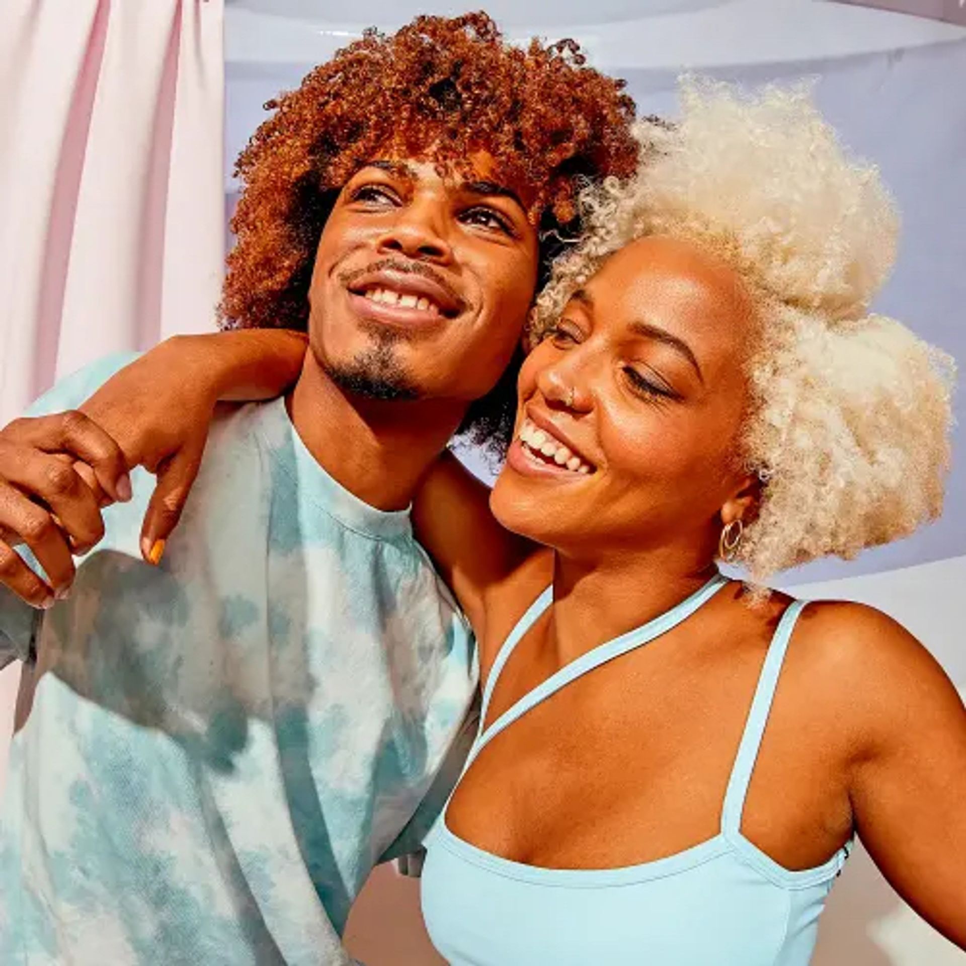 male and female models posing together