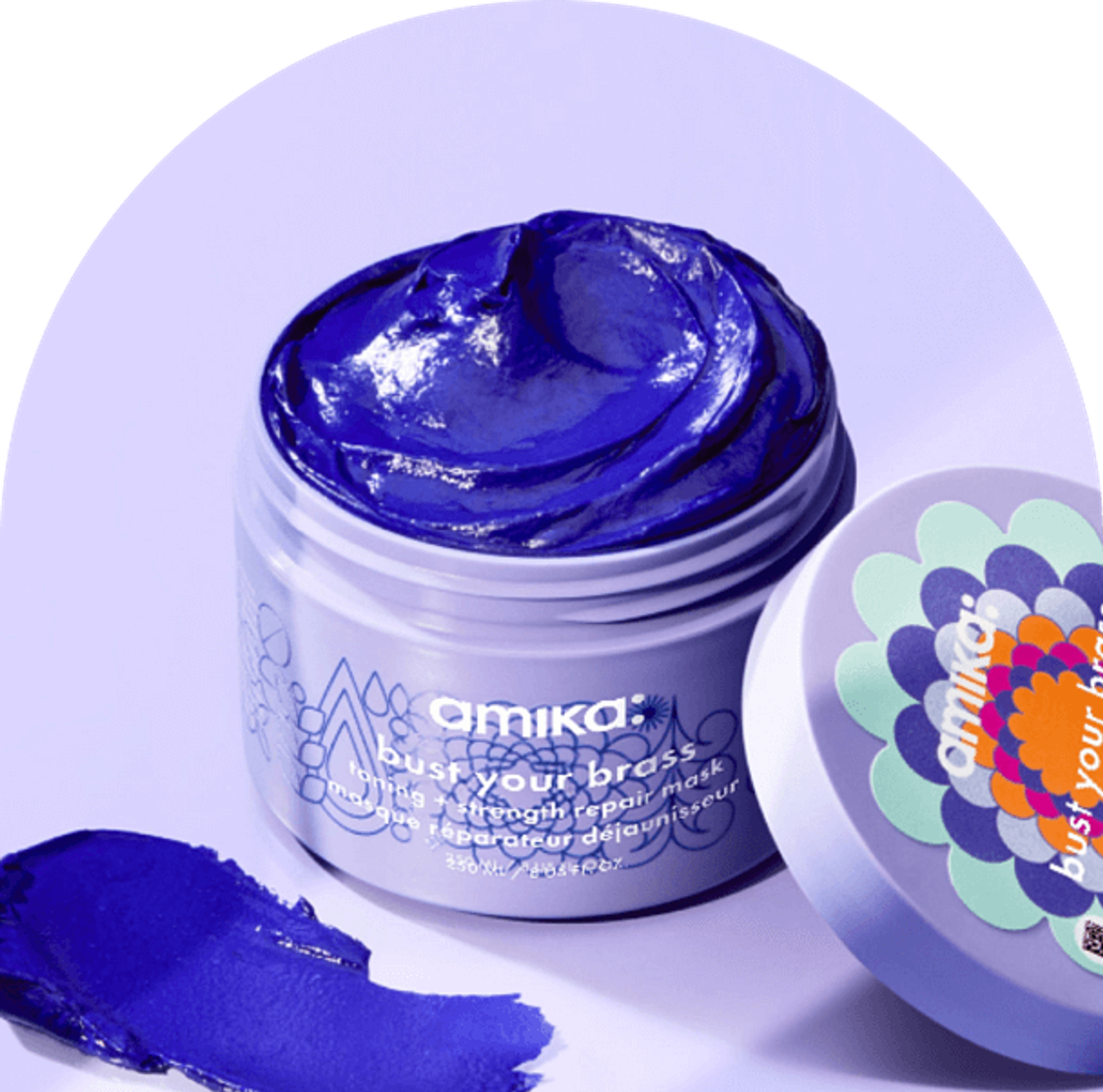 amika bust your brass repair mask against a light purple background