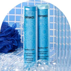 Image of hydro rush intense moisture shampoo and conditioner against a blue tiled background.