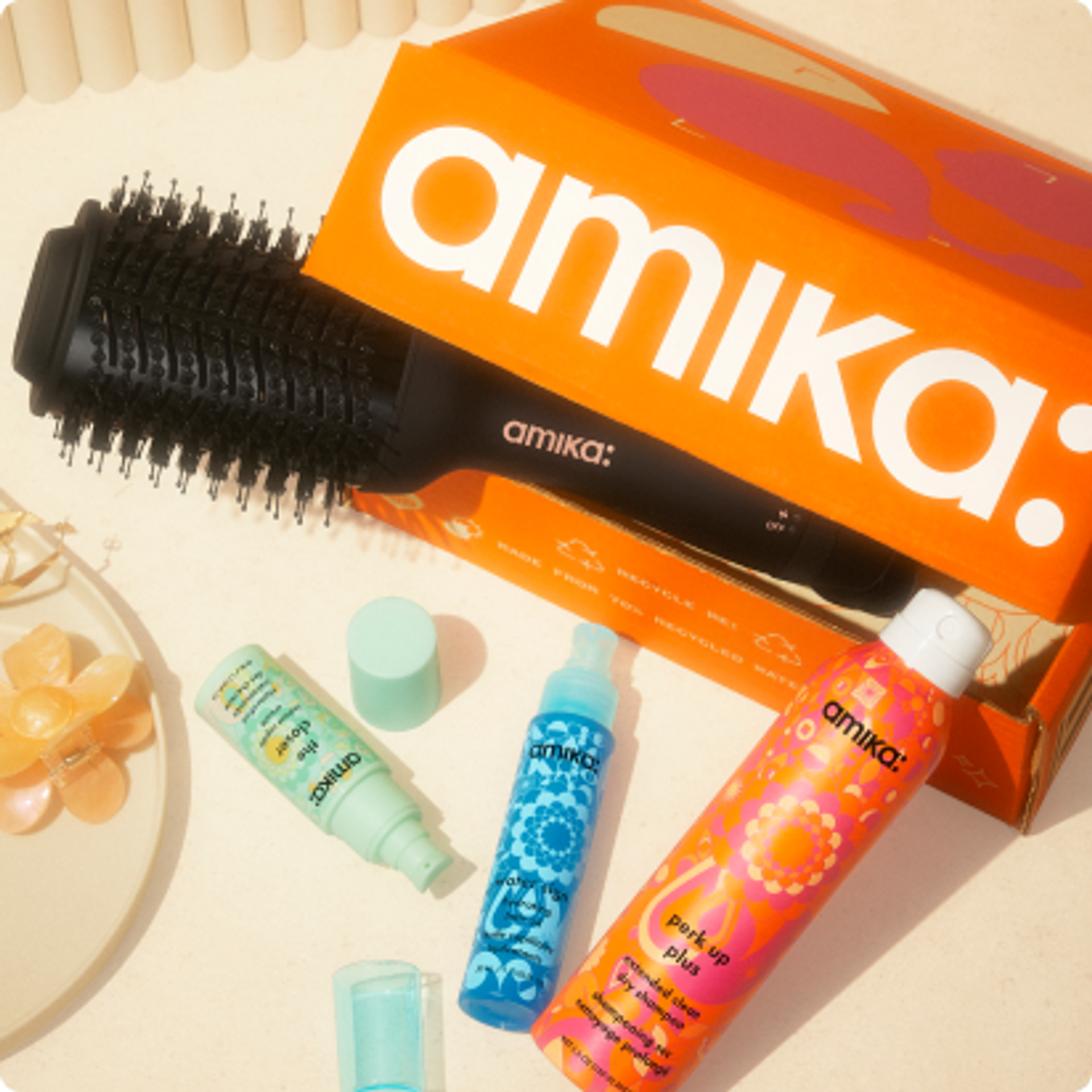 hair blow dryer brush 2.0, water sign hydrating hair oil, the closer instant repair hair cream, and perk up plus dry shampoo