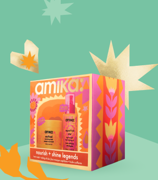 amika nourish + shine legends holiday gift set posed against a light green background and with some gold shapes behind the box