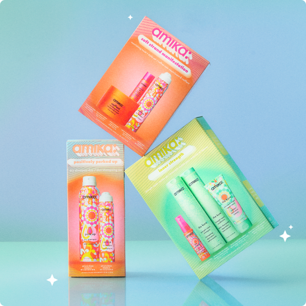 Image of the three top of the holiday 2025 sets, including 'soft strand manifestation', 'positively perk up' and 'inner strength'