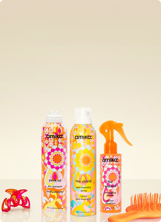 amika summer saviors - perk up, the shield, and the wizard bottles sit against a cream background