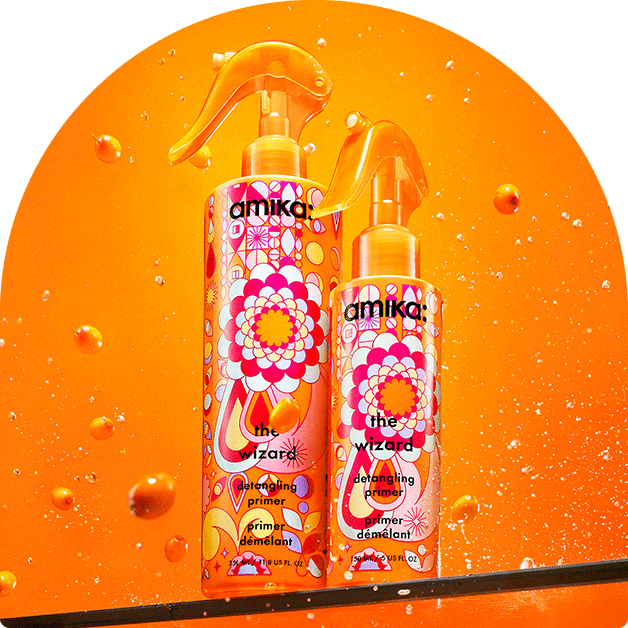 the wizard detangling primer animated gif with sea buckthorn floating in water