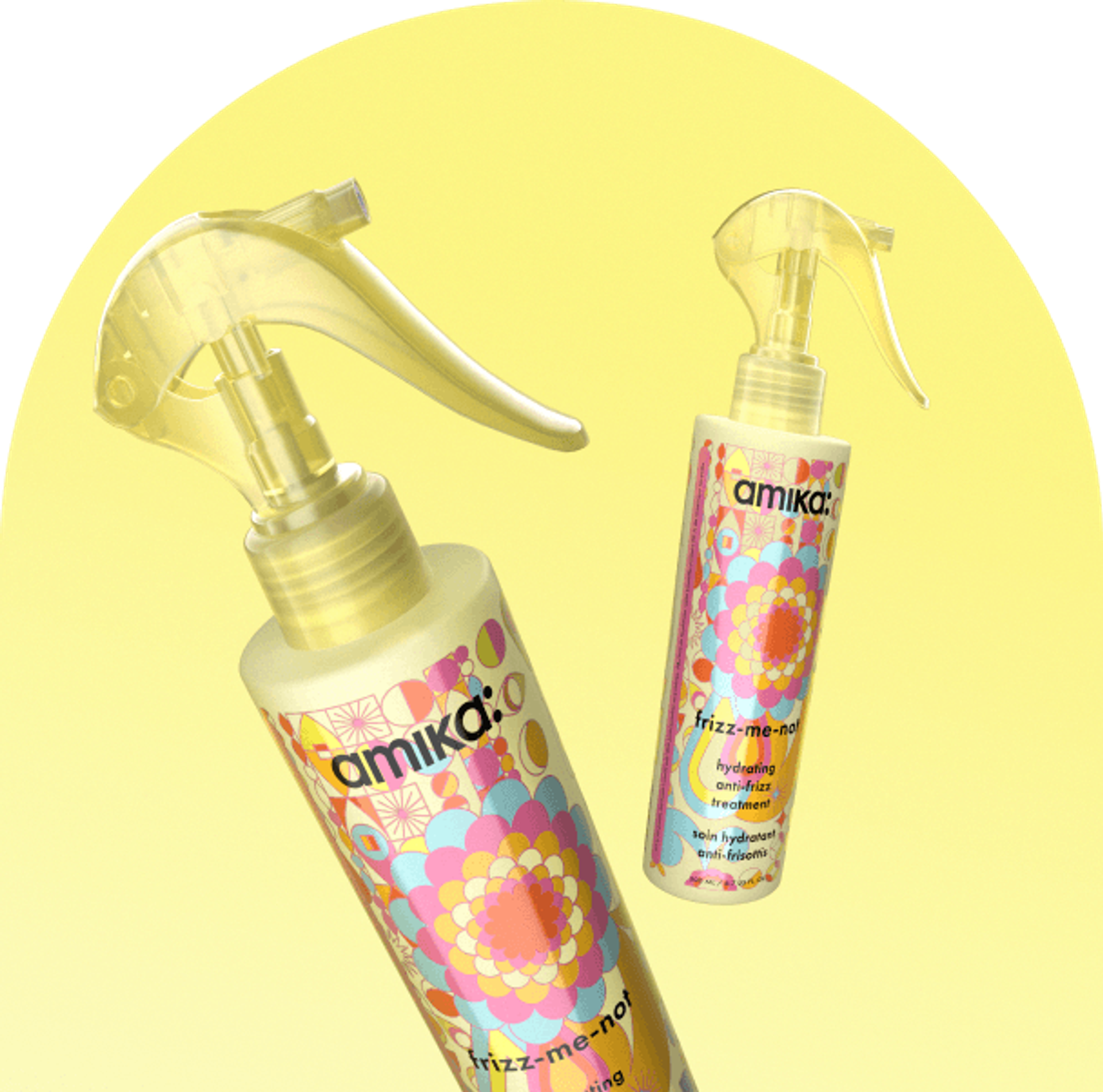 bottles of amika frizz-me-not float against a yellow background
