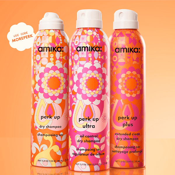 amika perk up collection - bottles of perk up, perk up plus, and perk up ultra sit against an orange gradient background