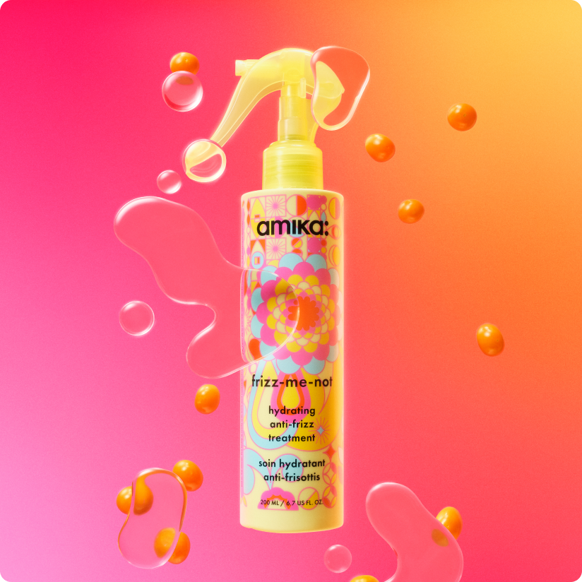 image of frizz-me-not surrounded by its key ingredients. key ingredients include sea buckthorn and extended humidity shield. background is a pink and orange gradient.