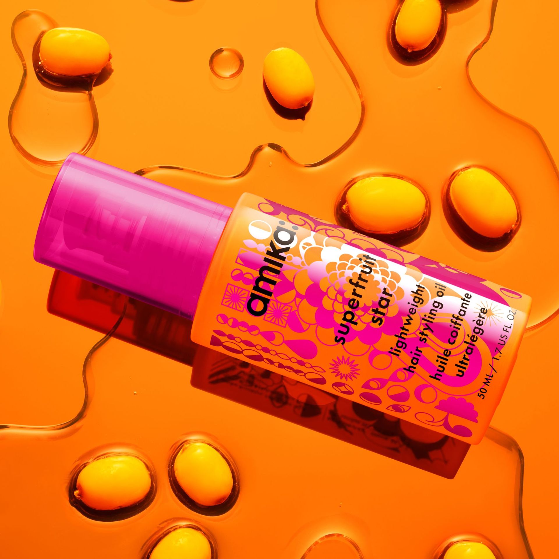 bottle of superfruit star against an orange background
